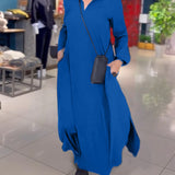 Robe longue Sylvie bleue, col à revers, manches longues et fente