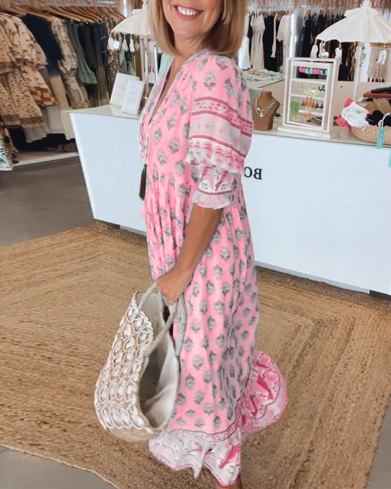 Robe midi Mana à imprimé floral rose, vue de profil