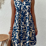 Tasha - Robe Midi Fluide Épanouissante