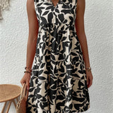 Tasha - Robe Midi Fluide Épanouissante
