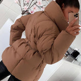 Élise – manteau oversize porté en superposition