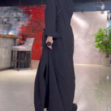 Robe longue Sylvie noire, vue de dos montrant la fente